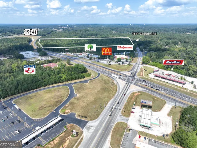 a view of a balcony with an outdoor space
