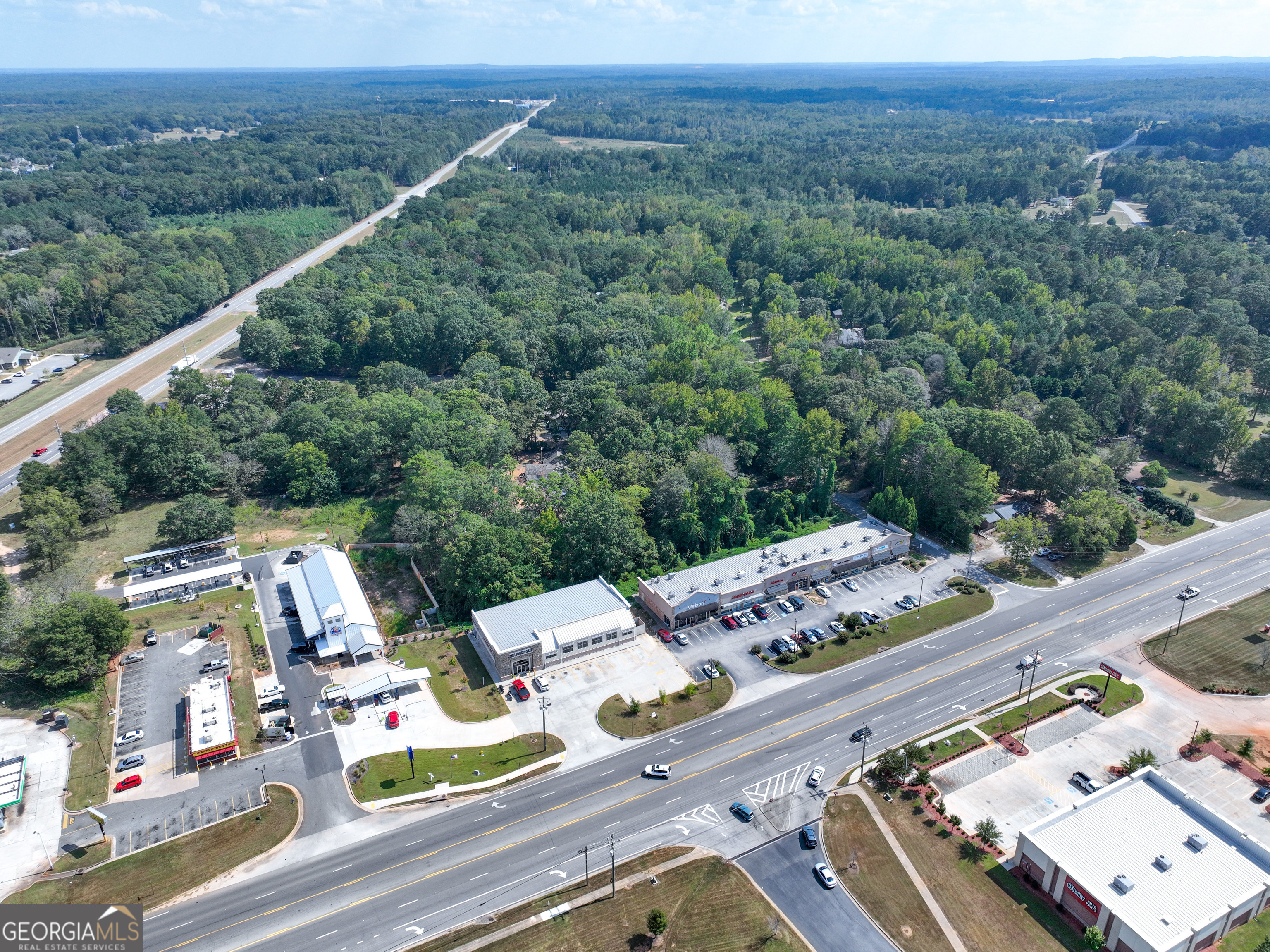 1541 Zebulon Road, Unit 4 TRACTS 35 ACRES Griffin, GA 30224 - Photo 14 of 26 a view of city from balcony with seating space