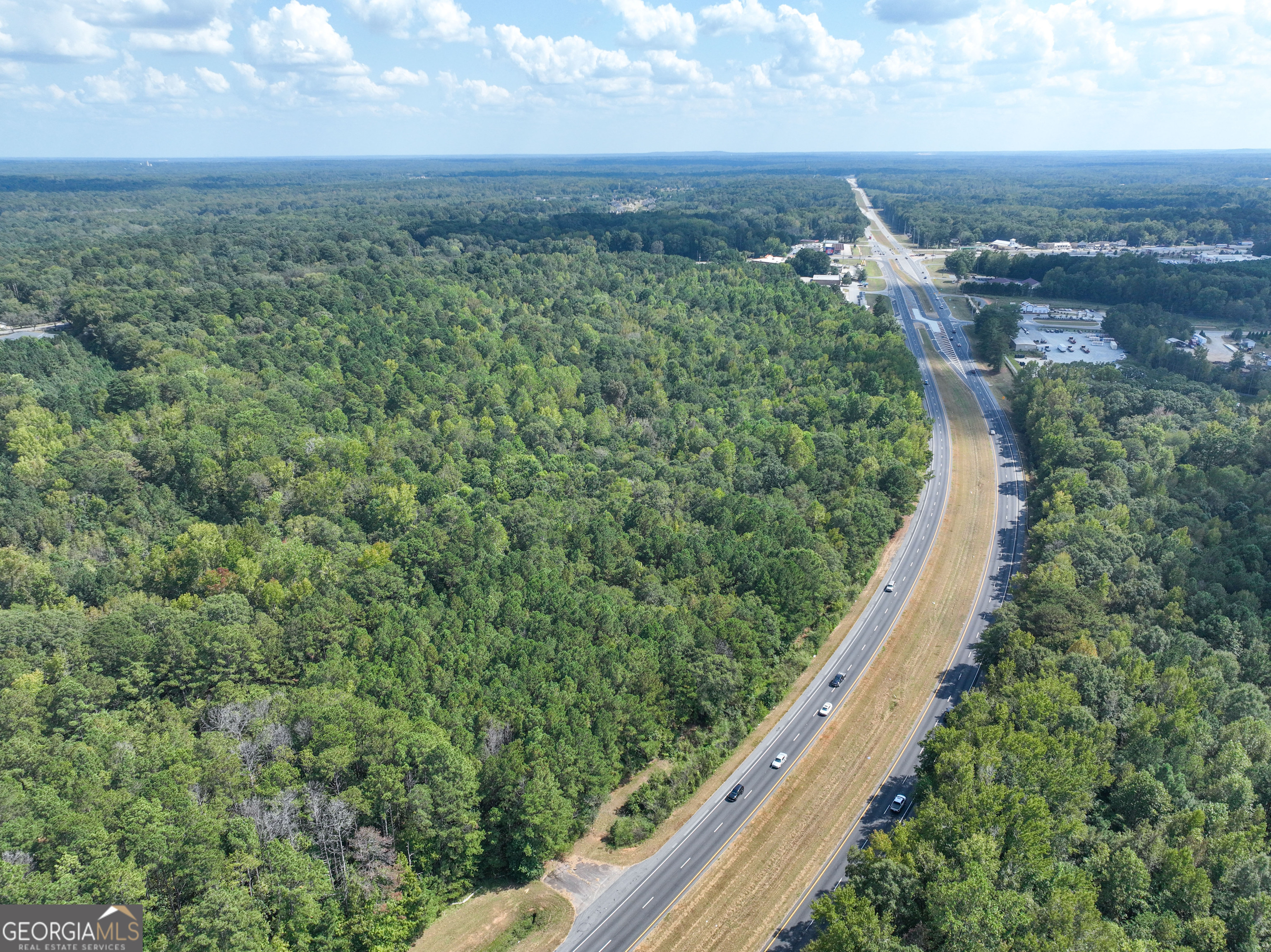 1541 Zebulon Road, Unit 4 TRACTS 35 ACRES Griffin, GA 30224 - Photo 15 of 26 a view of a city from a balcony