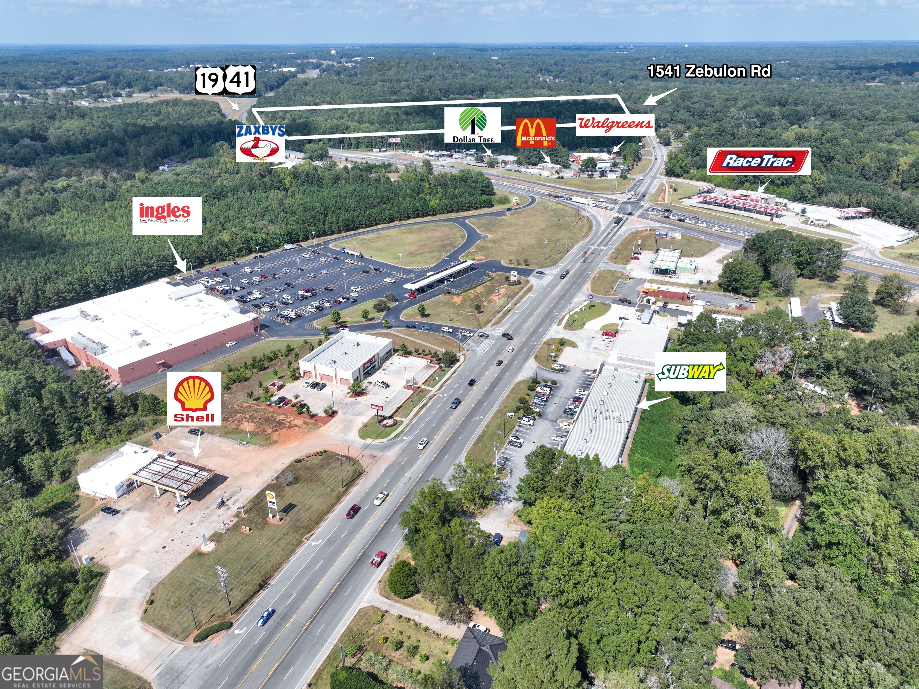 1541 Zebulon Road, Unit 4 TRACTS 35 ACRES Griffin, GA 30224 - Photo 3 of 26 an aerial view of a house with a garden