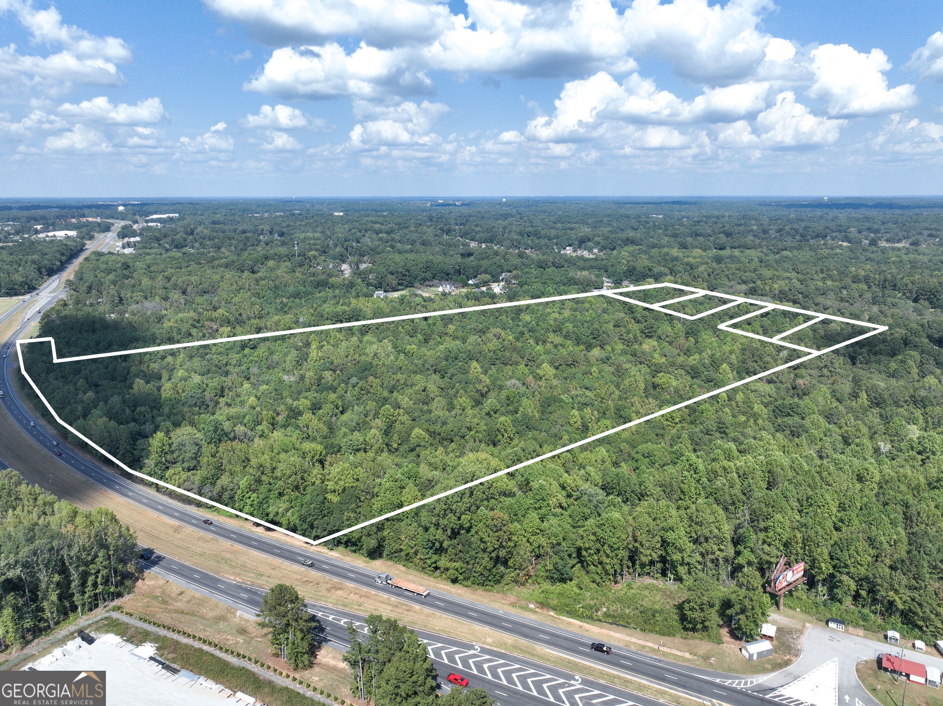 1541 Zebulon Road, Unit 4 TRACTS 35 ACRES Griffin, GA 30224 - Photo 7 of 26 a view of a city from a balcony