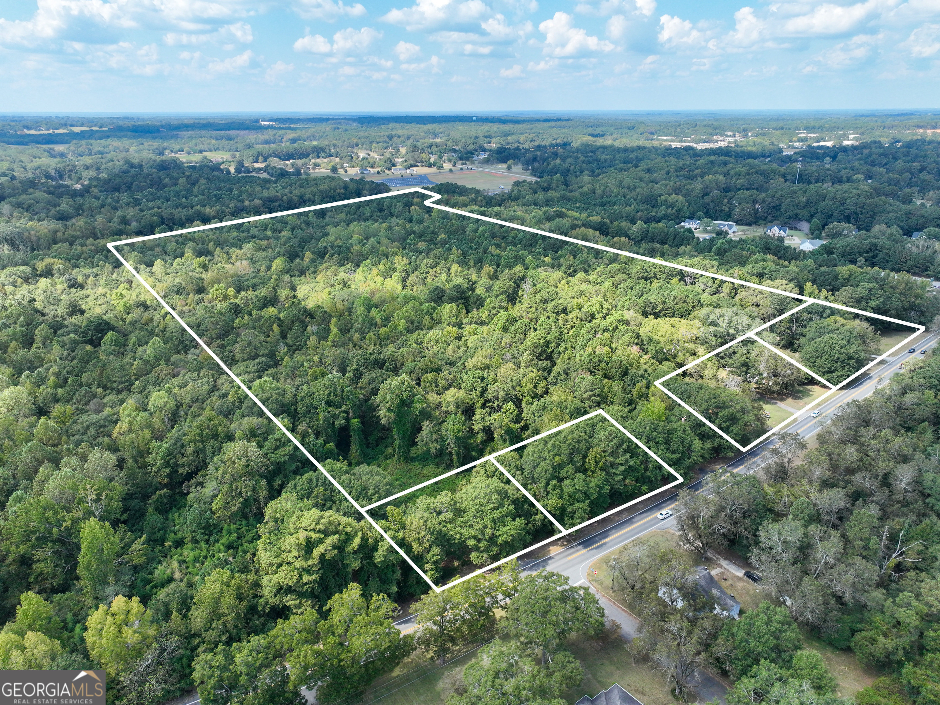 1541 Zebulon Road, Unit 4 TRACTS 35 ACRES Griffin, GA 30224 - Photo 8 of 26 a view of a balcony with mountain view