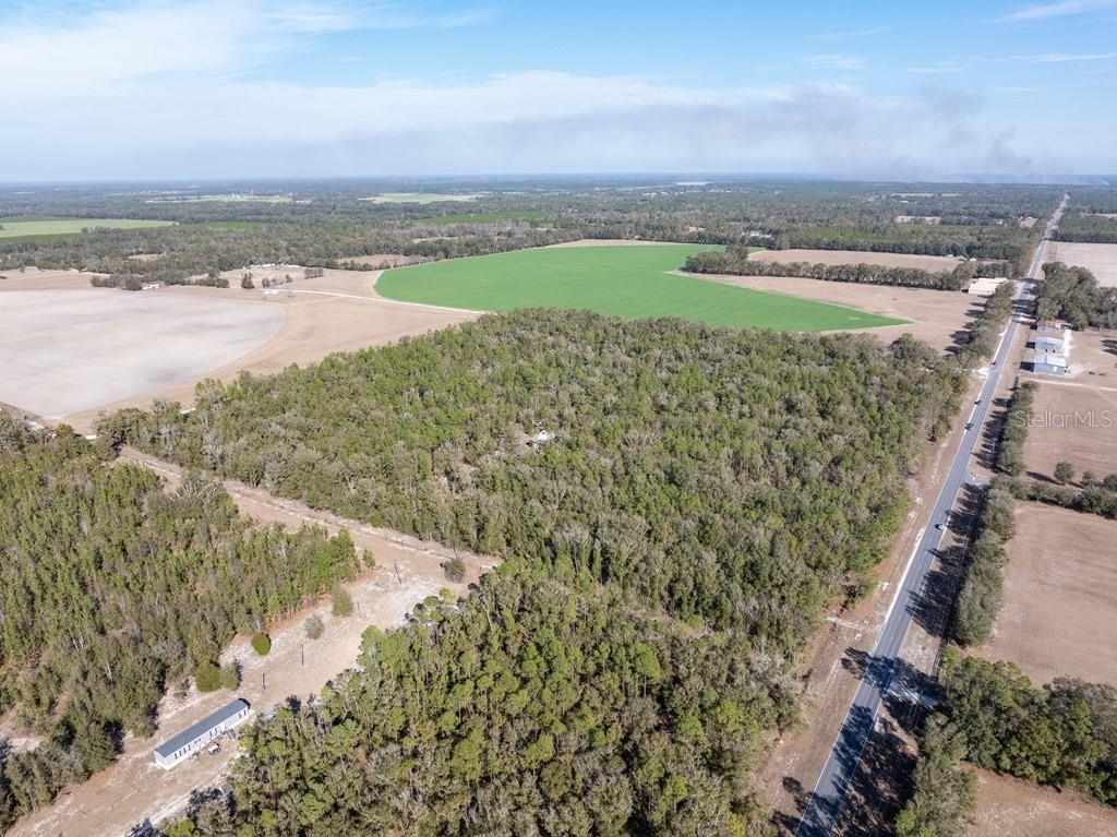 4700 County Road 340 Bell, FL 32619 - Photo 22 of 23 a view of a lake with a mountain