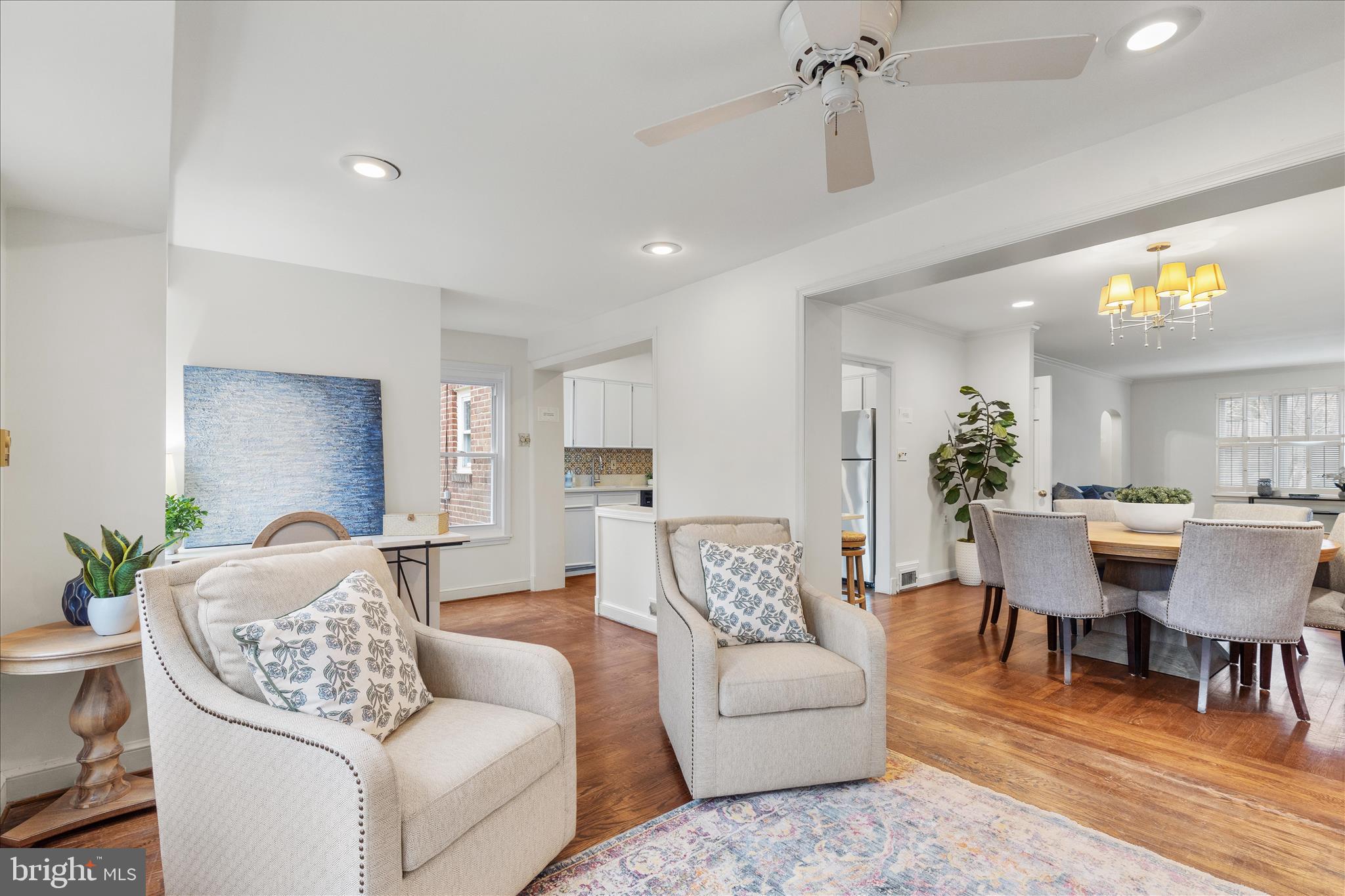 5352 29th Street Northwest Washington, DC 20015 - Photo 13 of 45 a living room with furniture and a dining table with kitchen view