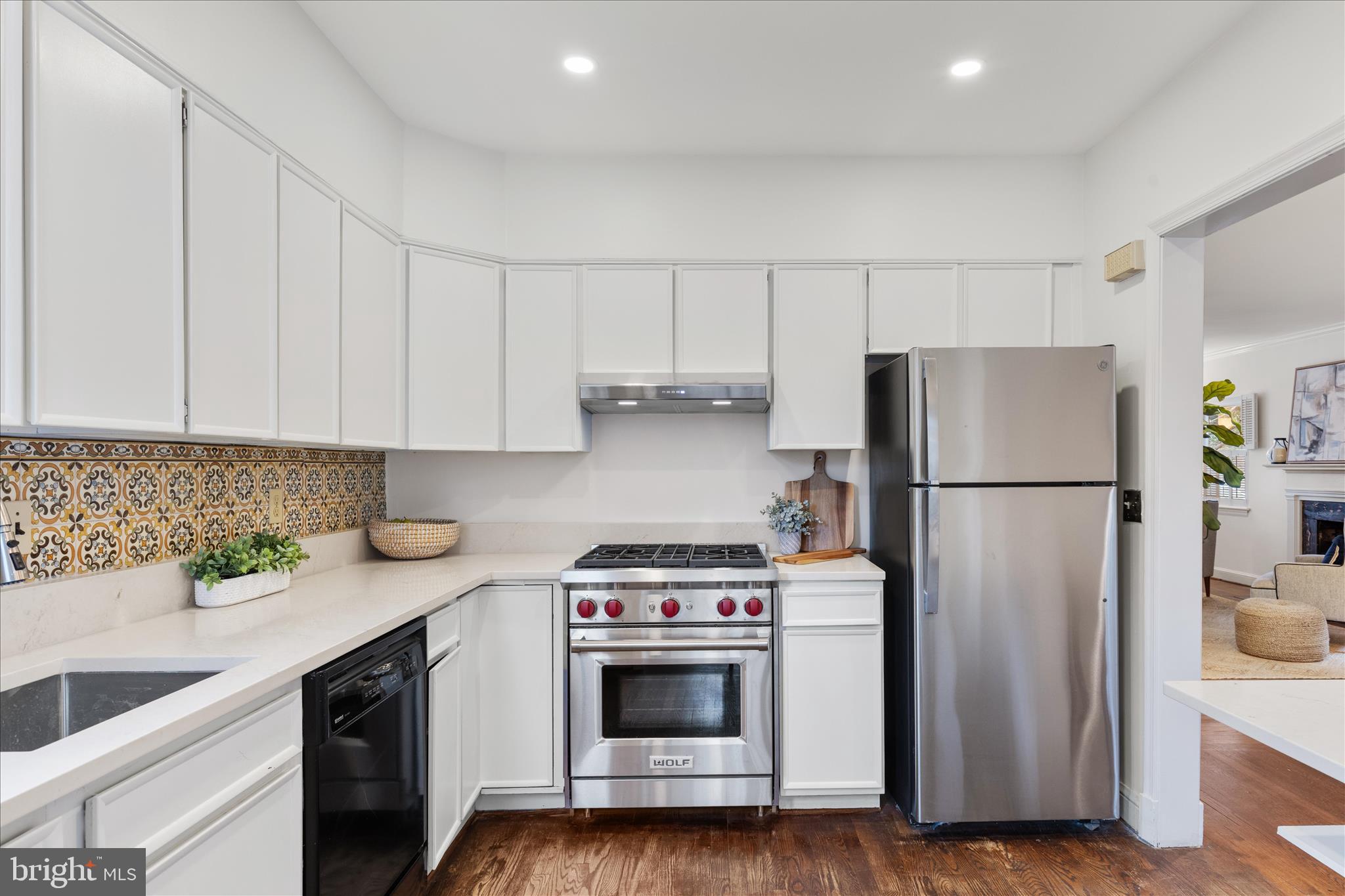 5352 29th Street Northwest Washington, DC 20015 - Photo 14 of 45 a kitchen with a refrigerator and a sink