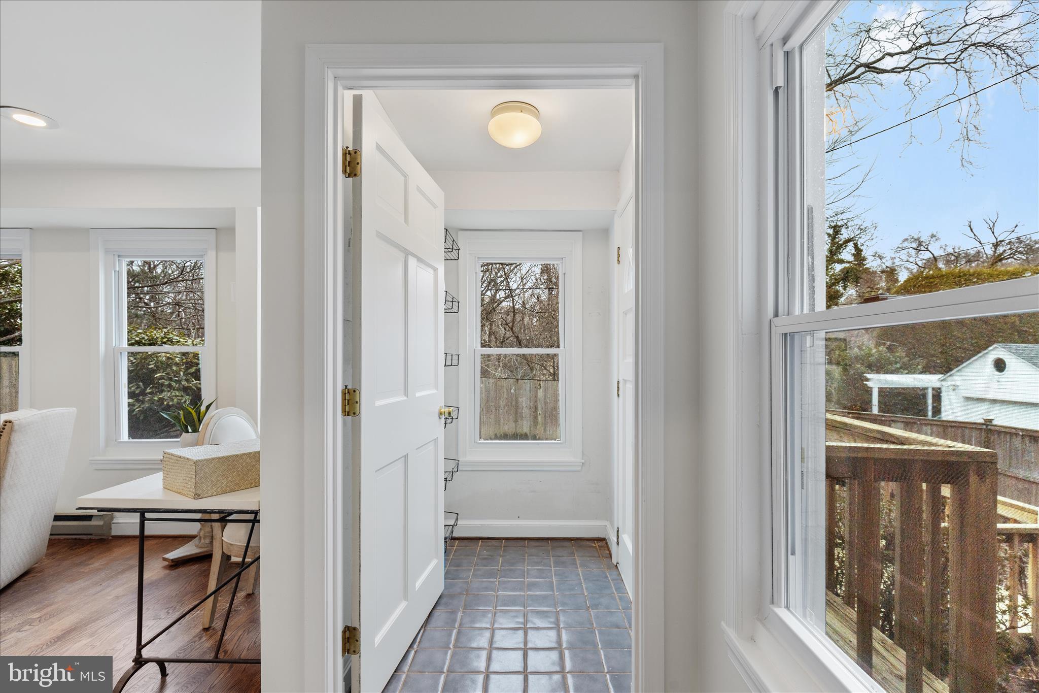 5352 29th Street Northwest Washington, DC 20015 - Photo 17 of 45 a view of a livingroom with furniture and window