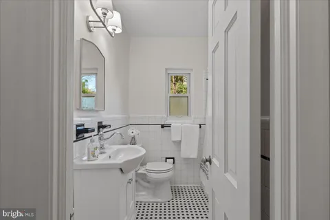 a view of room with wooden floor and workspace