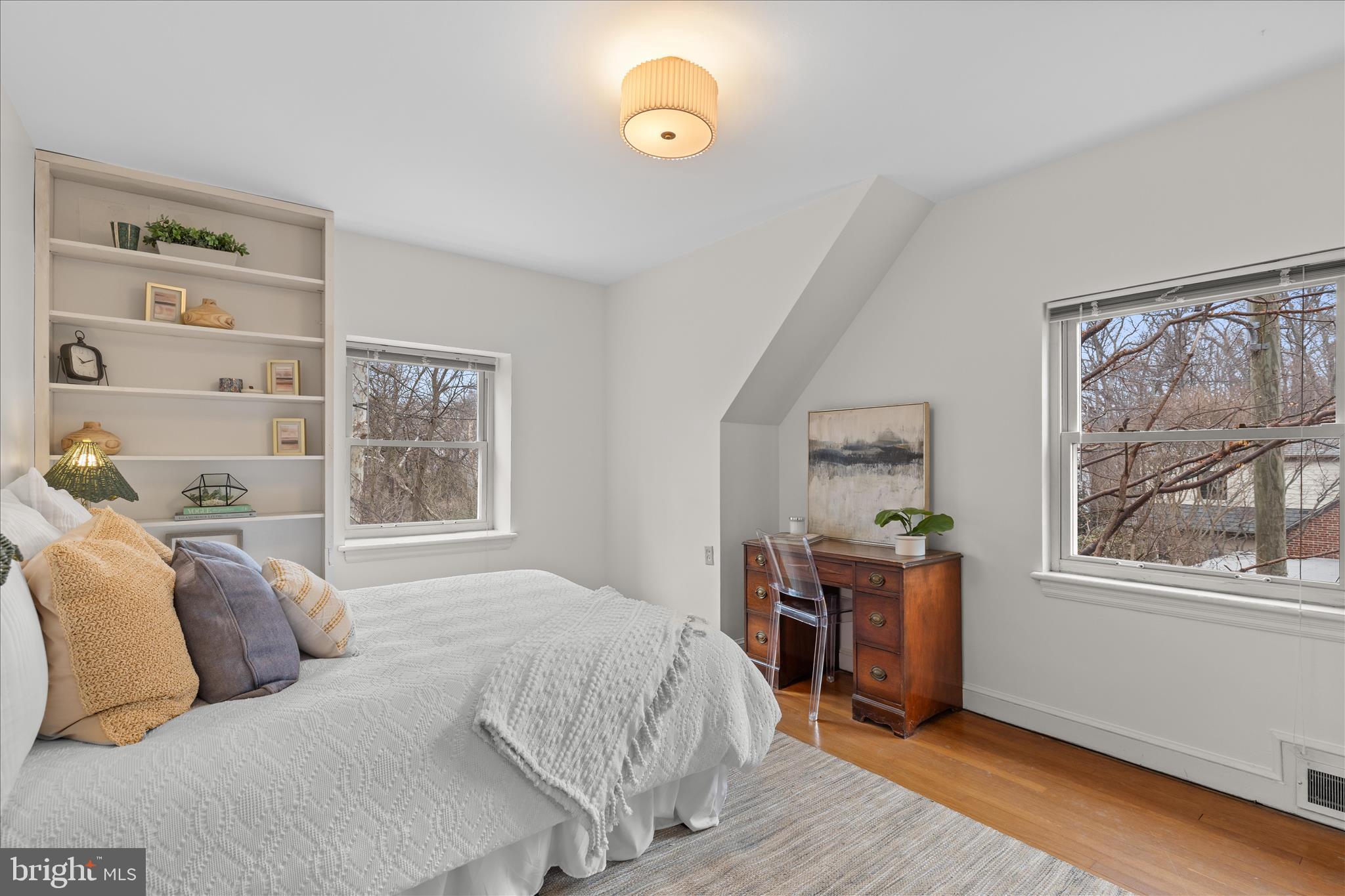 5352 29th Street Northwest Washington, DC 20015 - Photo 28 of 45 a bedroom with a bed and a window