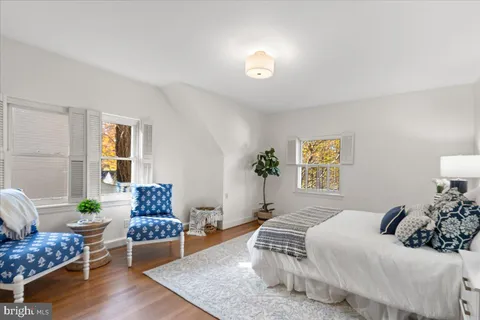 a bathroom with a sink a mirror and a shower