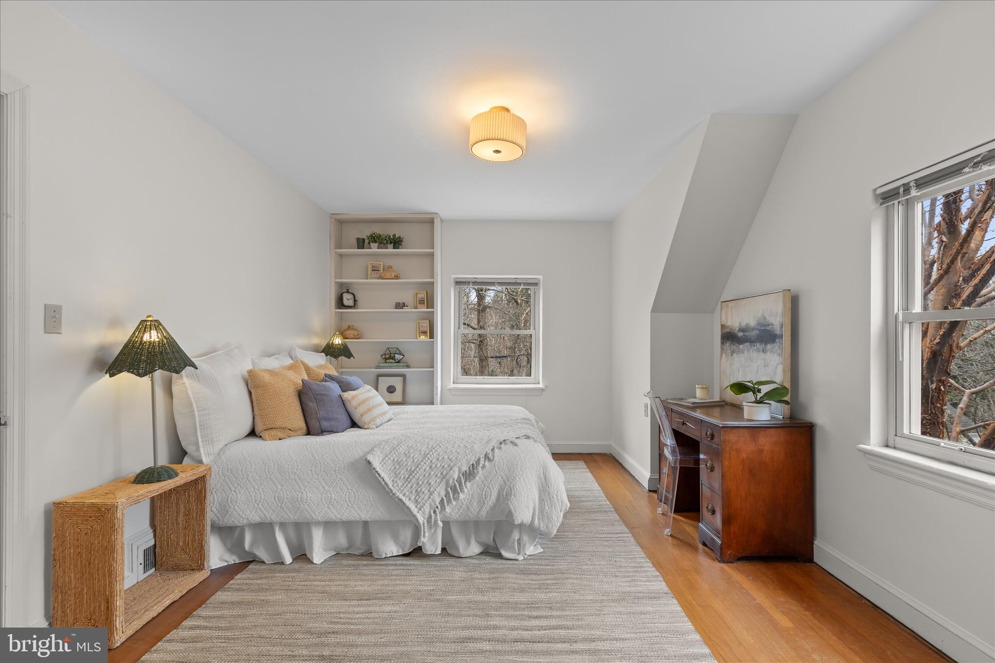5352 29th Street Northwest Washington, DC 20015 - Photo 29 of 45 a bedroom with furniture and a window