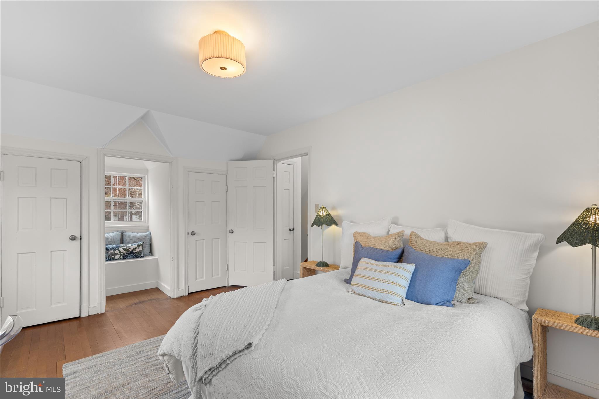 5352 29th Street Northwest Washington, DC 20015 - Photo 30 of 45 a bedroom with a bed and a cabinets