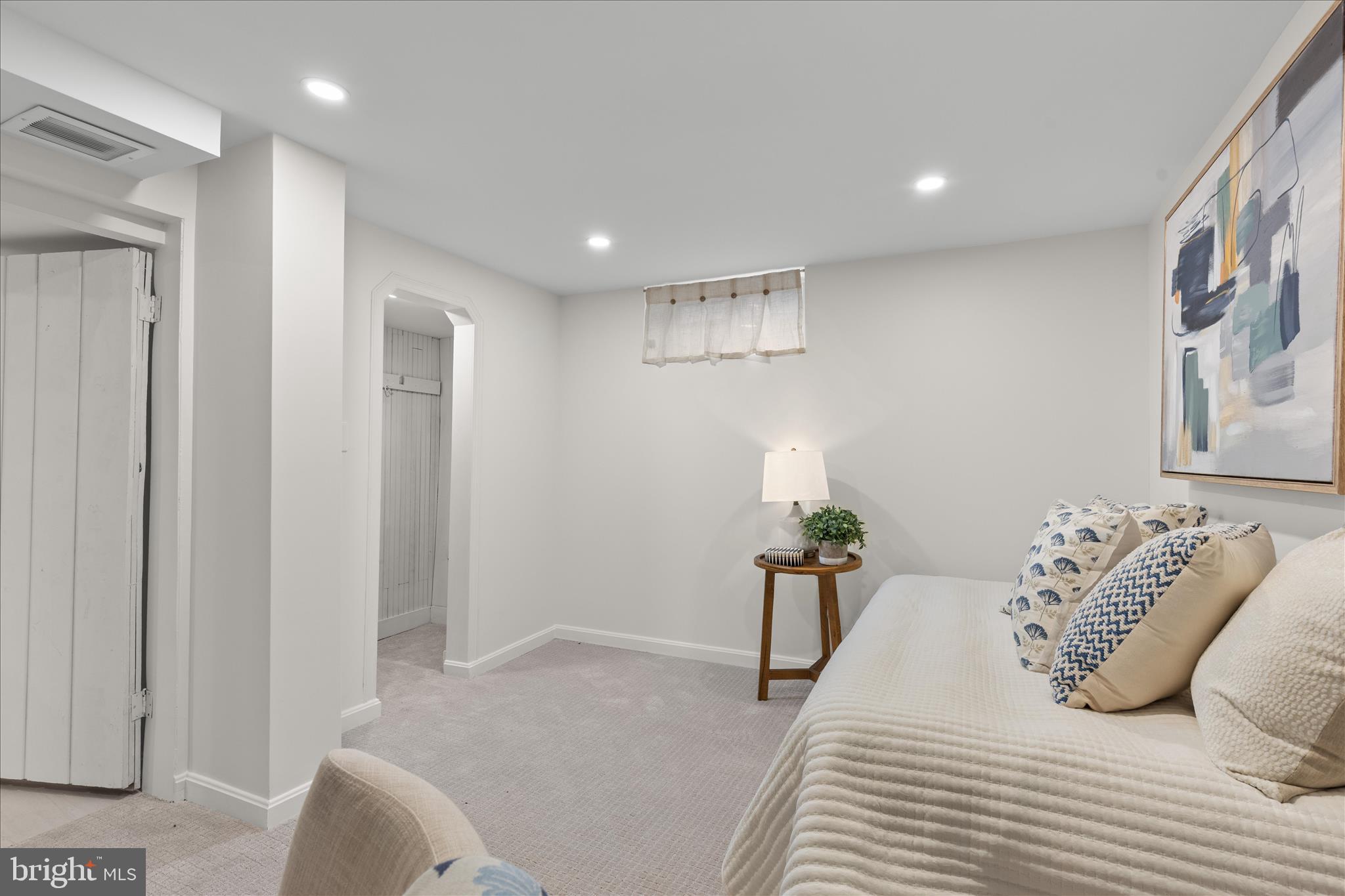 5352 29th Street Northwest Washington, DC 20015 - Photo 38 of 45 a bedroom with a bed and hallway