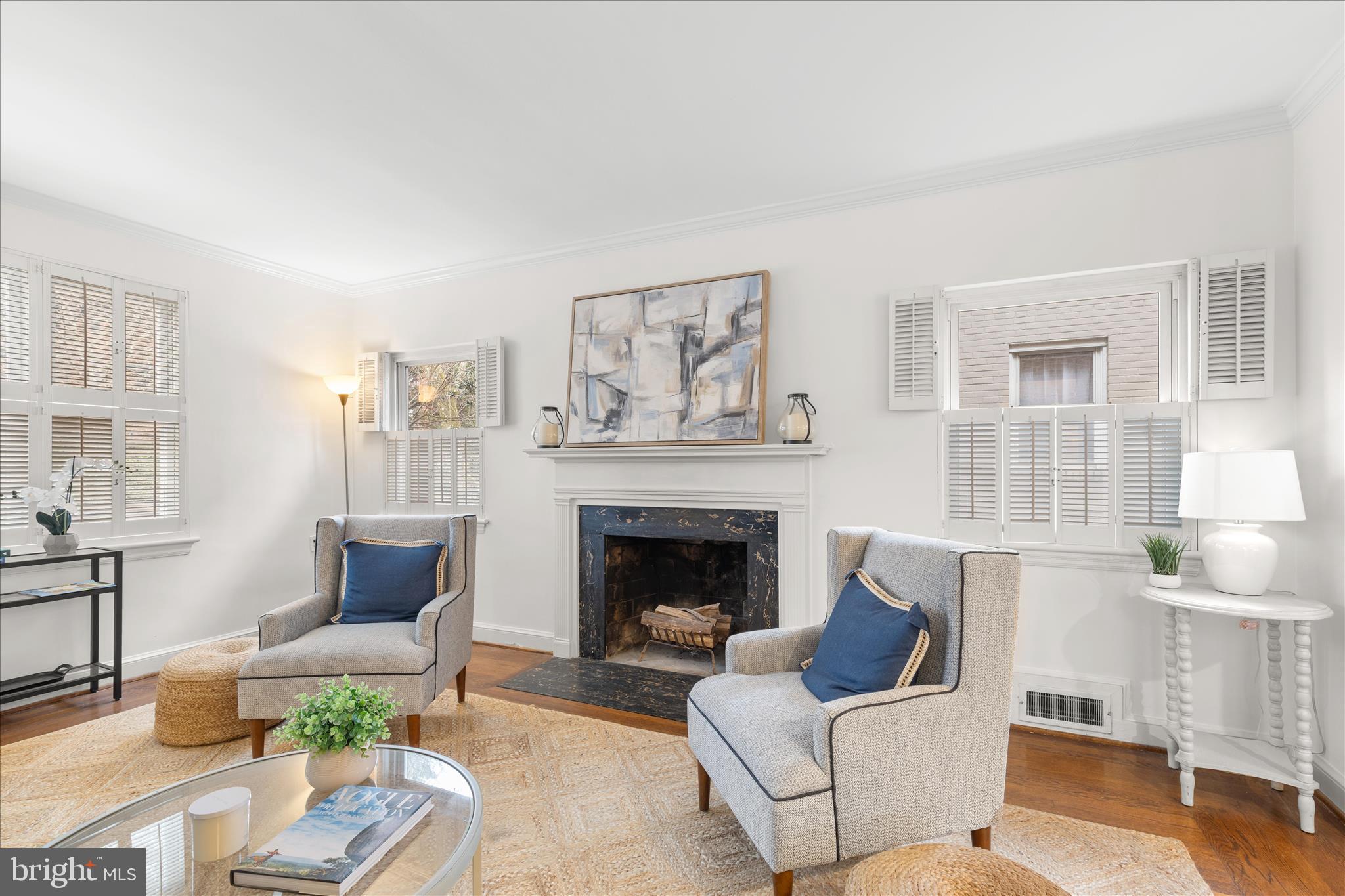 5352 29th Street Northwest Washington, DC 20015 - Photo 4 of 45 a living room with furniture and a fireplace