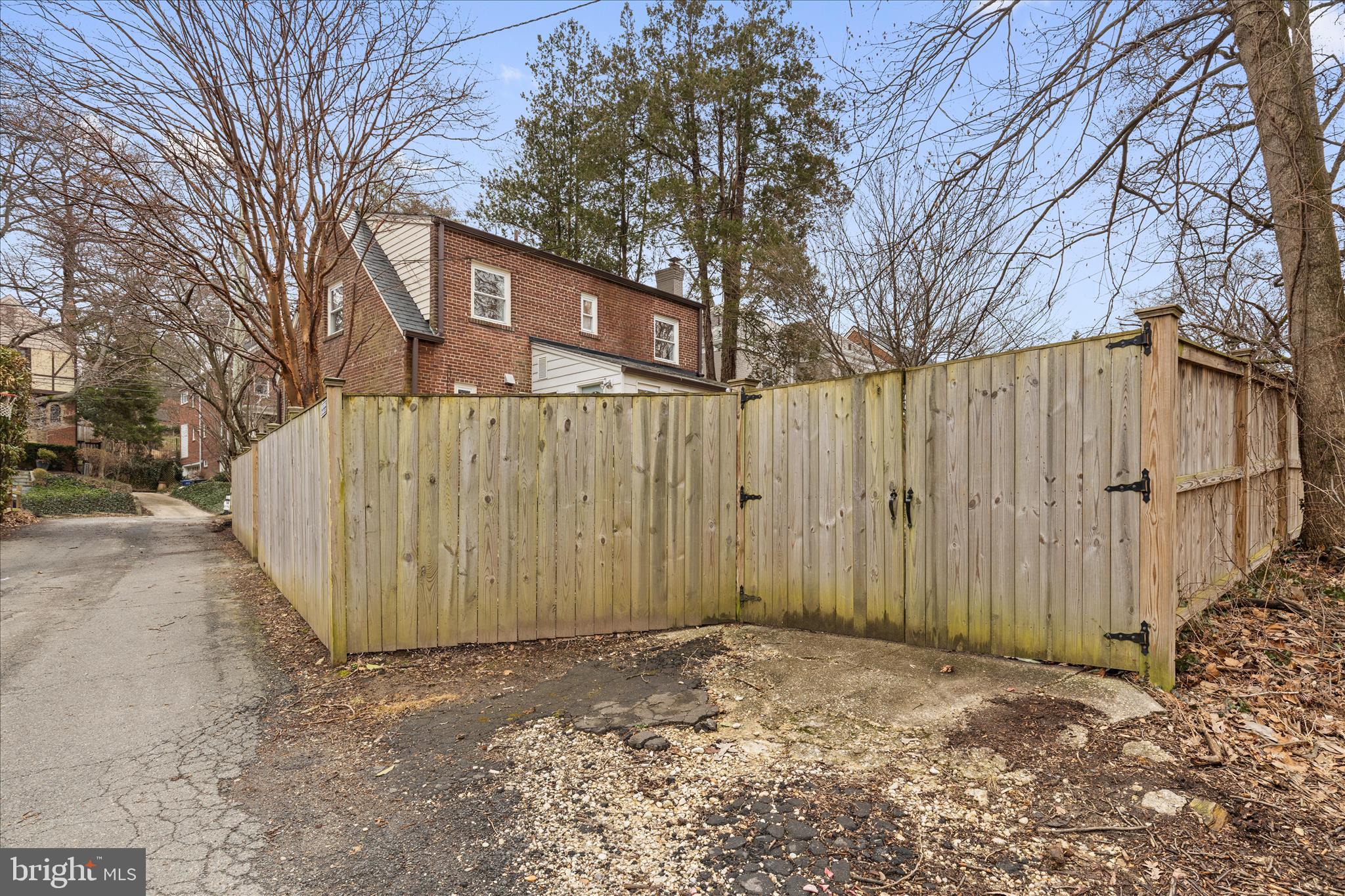 5352 29th Street Northwest Washington, DC 20015 - Photo 44 of 45 a view of a blue house with a large tree