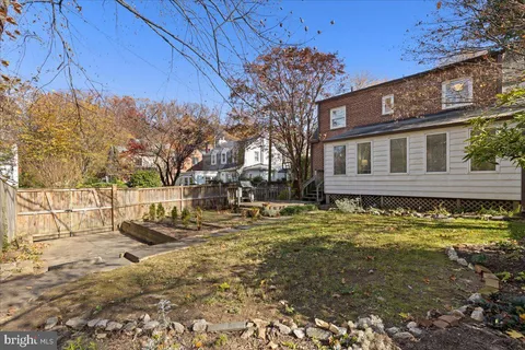 a front view of a house with a swimming pool