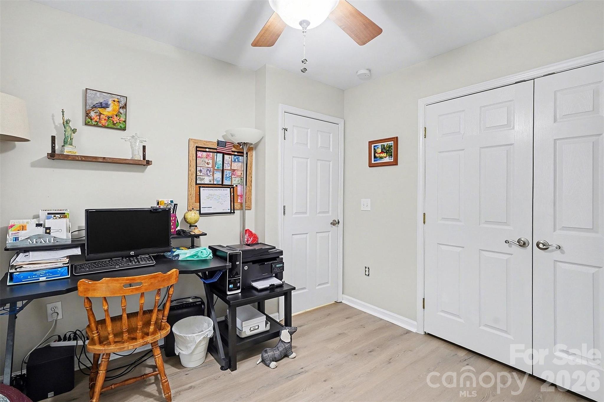 202 East 27th Street Kannapolis, NC 28083 - Photo 23 of 29 a view of a workspace with furniture and a window