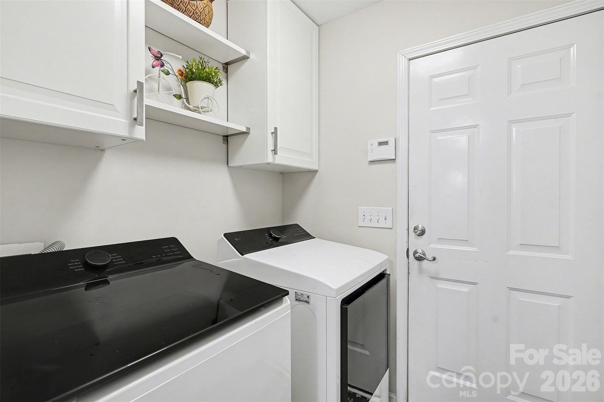 202 East 27th Street Kannapolis, NC 28083 - Photo 24 of 29 a utility room with dryer and washer