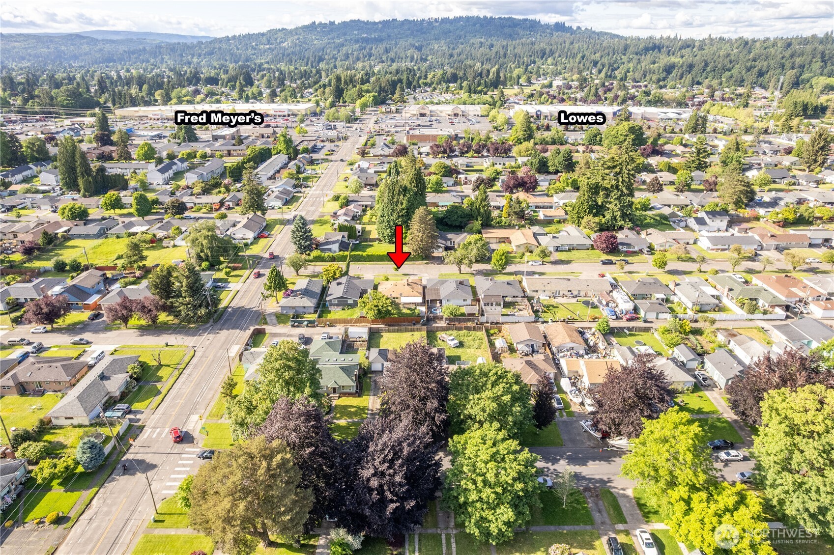 2943 Magnolia Street Longview, WA 98632 - Photo 36 of 36 an aerial view of residential houses with outdoor space and trees