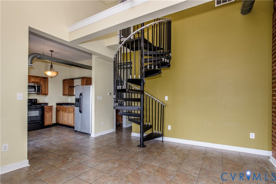 1012 West Franklin Street Richmond, VA 23220 - Photo 21 of 27 a view of entryway and hall with wooden floor