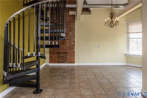 a view of an entryway with a door