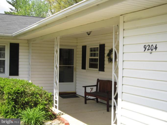 9204 Lawnview Lane Laurel, MD 20708 - Photo 8 of 24 Covered Front Patio Welcomes you Home