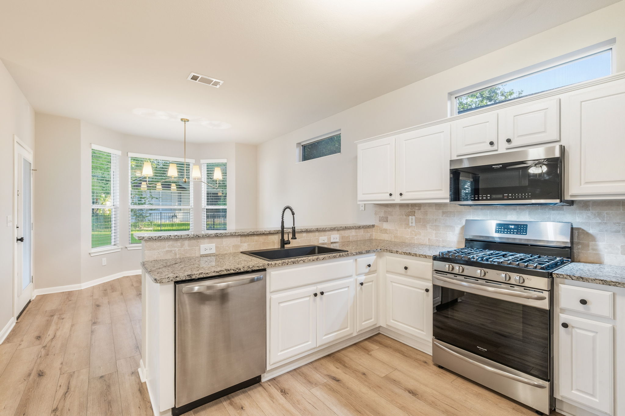 137 Trail Rider Way Georgetown, TX 78633 - Photo 6 of 29 A well-appointed kitchen features modern appliances and a functional layout, perfect for daily living.
