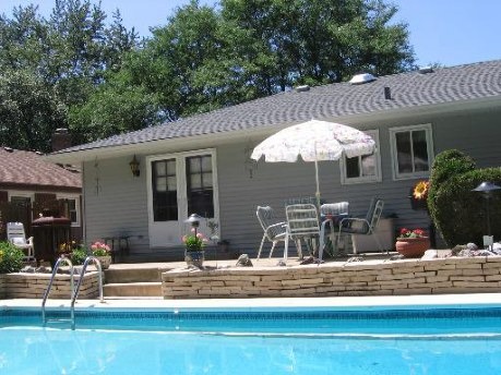 995 Ruth Drive Elgin, IL 60123 - Photo 21 of 23 a view of a house with backyard porch and sitting area