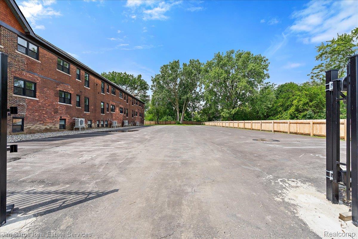 4735 Rohns Street, Unit 1B Detroit, MI 48214 - Photo 12 of 14 050-Remove Dumpster 4.jpg