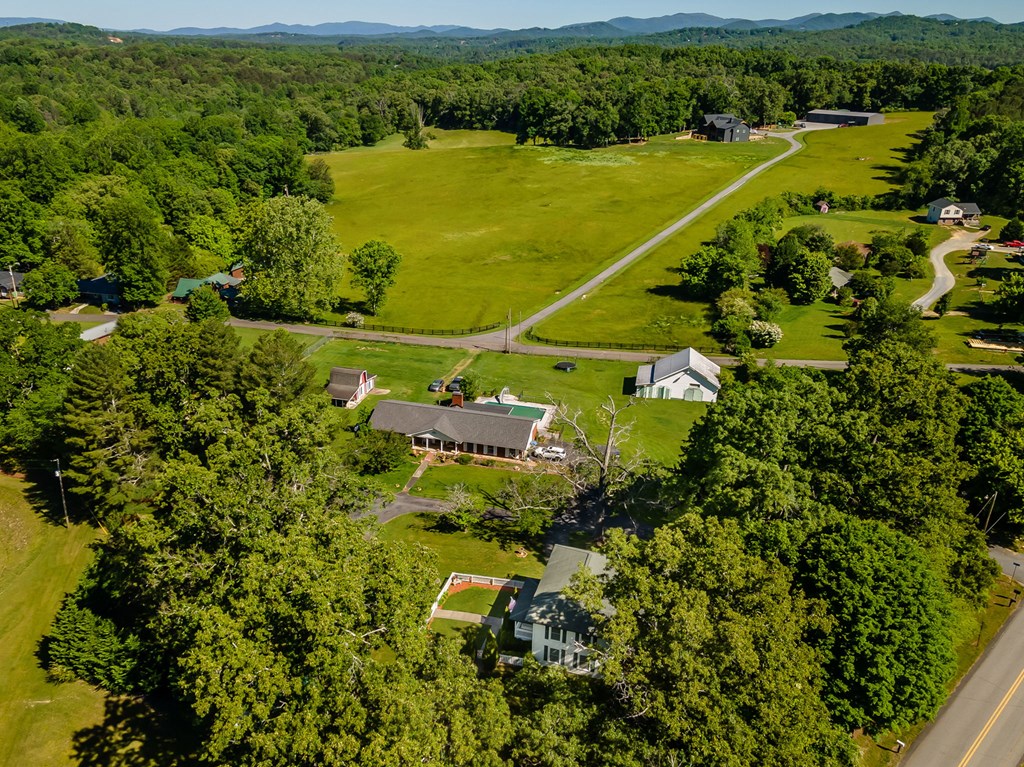 63 Loving Road Morganton, GA 30560 - Photo 56 of 58 an aerial view of a residential houses with outdoor space and trees
