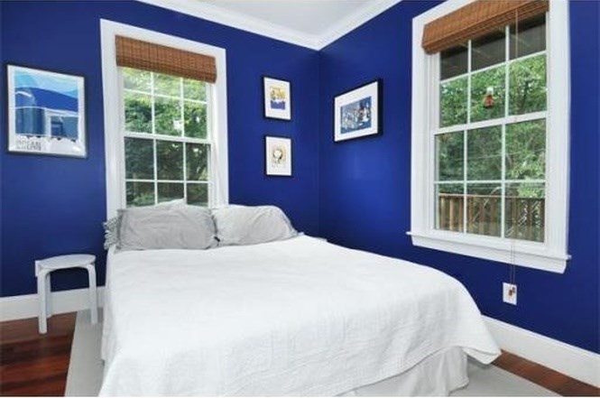 613-615 Dorchester Avenue, Unit 2 Boston, MA 02127 - Photo 7 of 12 a bedroom with a bed and a window