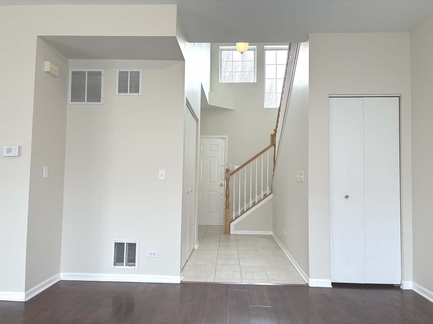 10089 Thornton Way Huntley, IL 60142 - Photo 6 of 16 a view of a hallway with windows