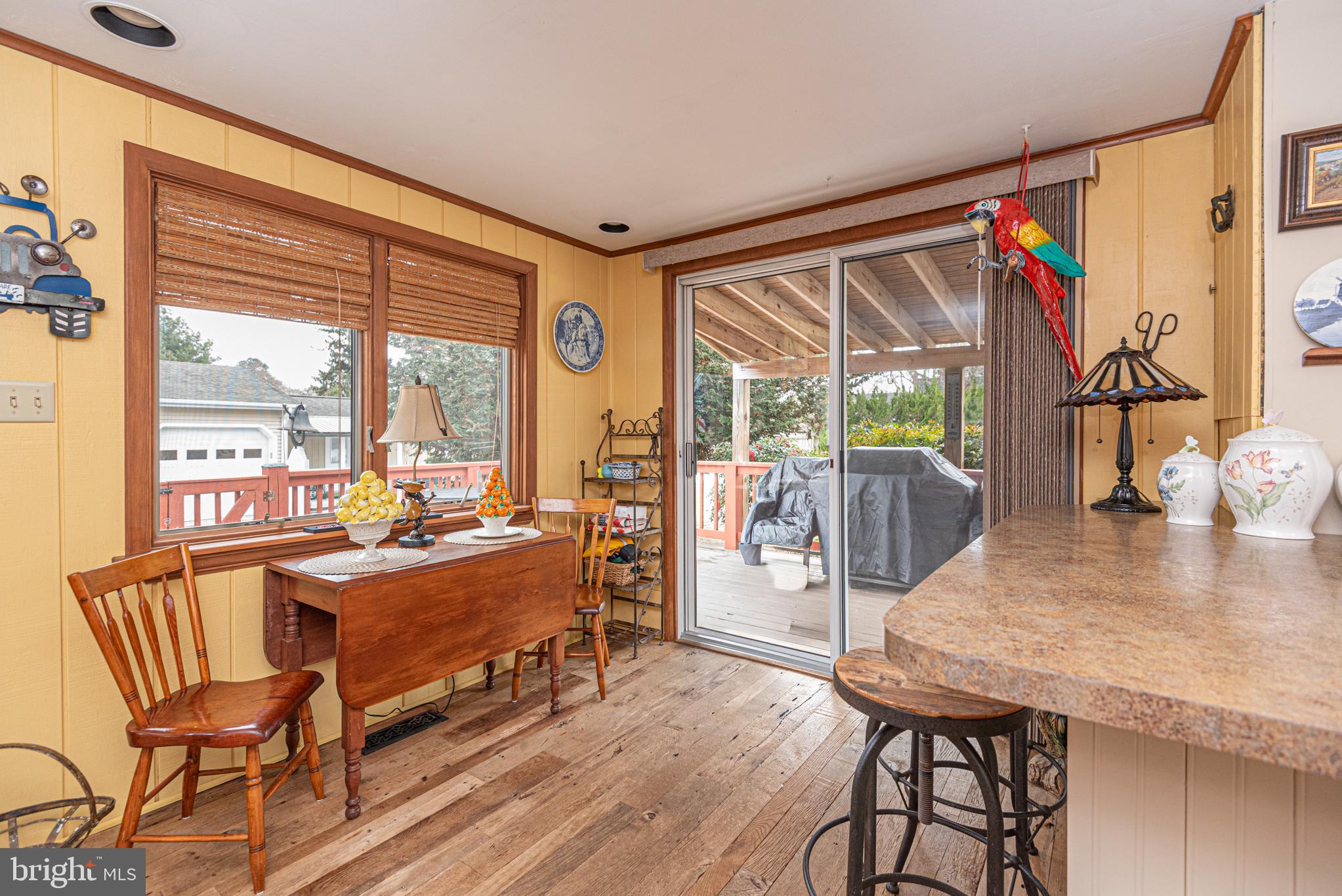 31468 Wingate Road Dagsboro, DE 19939 - Photo 12 of 45 a very nice looking room with a large window and dining table