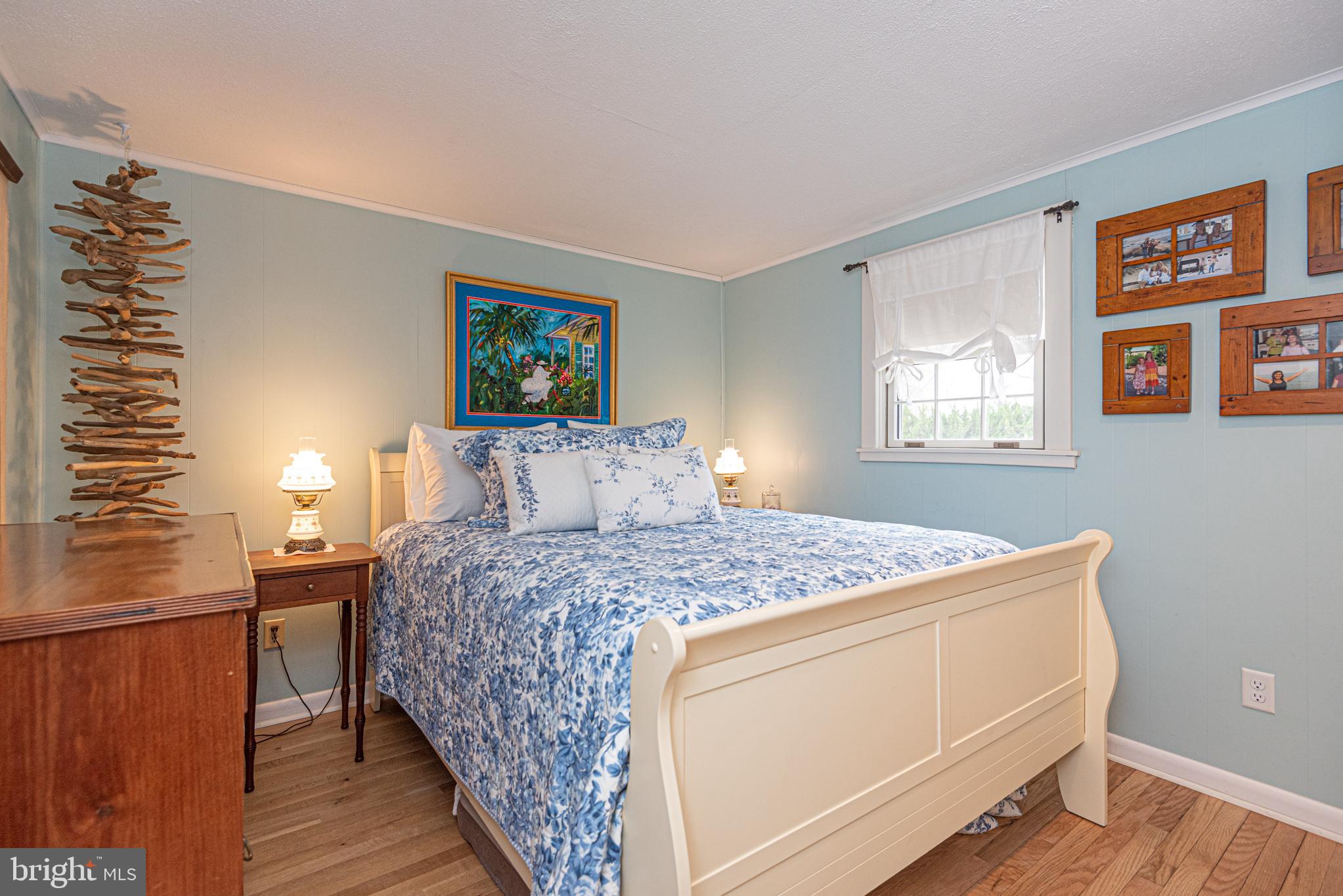 31468 Wingate Road Dagsboro, DE 19939 - Photo 26 of 45 a bedroom with a bed and a window