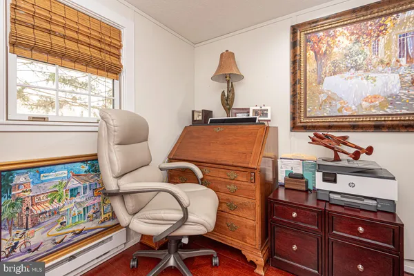 a room with furniture and a window