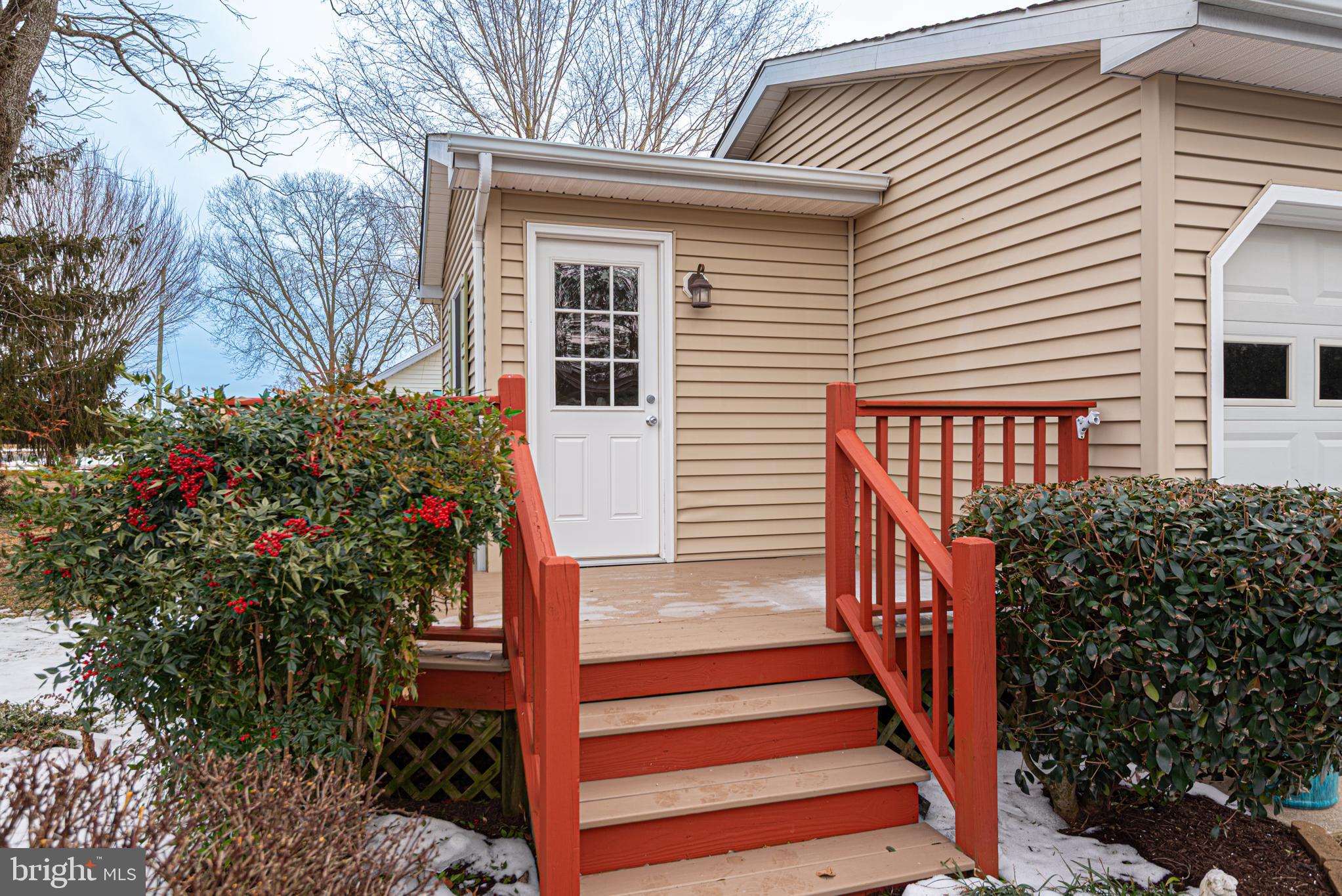 31468 Wingate Road Dagsboro, DE 19939 - Photo 32 of 45 a front view of a house with a garden