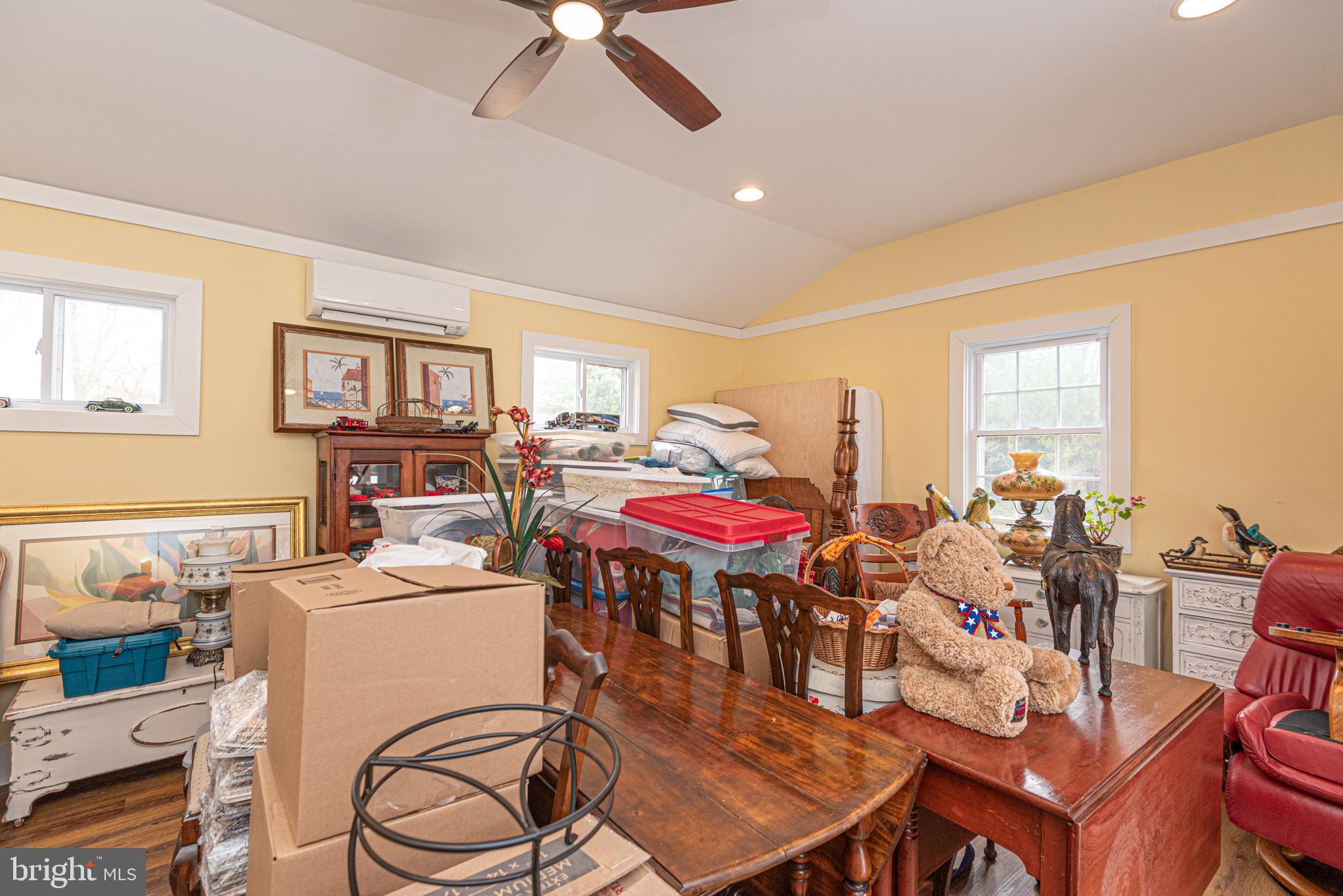 31468 Wingate Road Dagsboro, DE 19939 - Photo 36 of 45 a room with a table chairs and a dining table