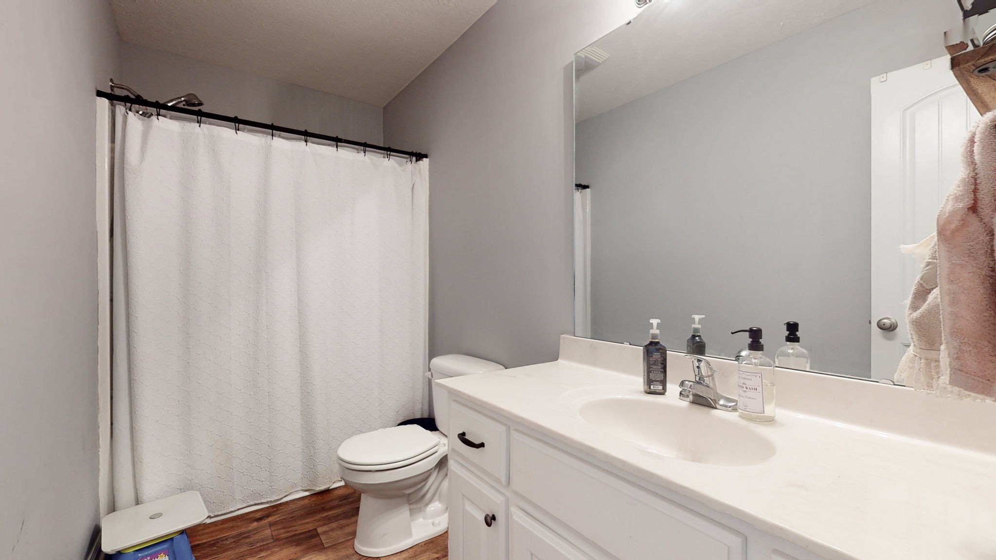 7018 Charity Road Petersburg, TN 37144 - Photo 15 of 25 a bathroom with a sink a toilet and a mirror