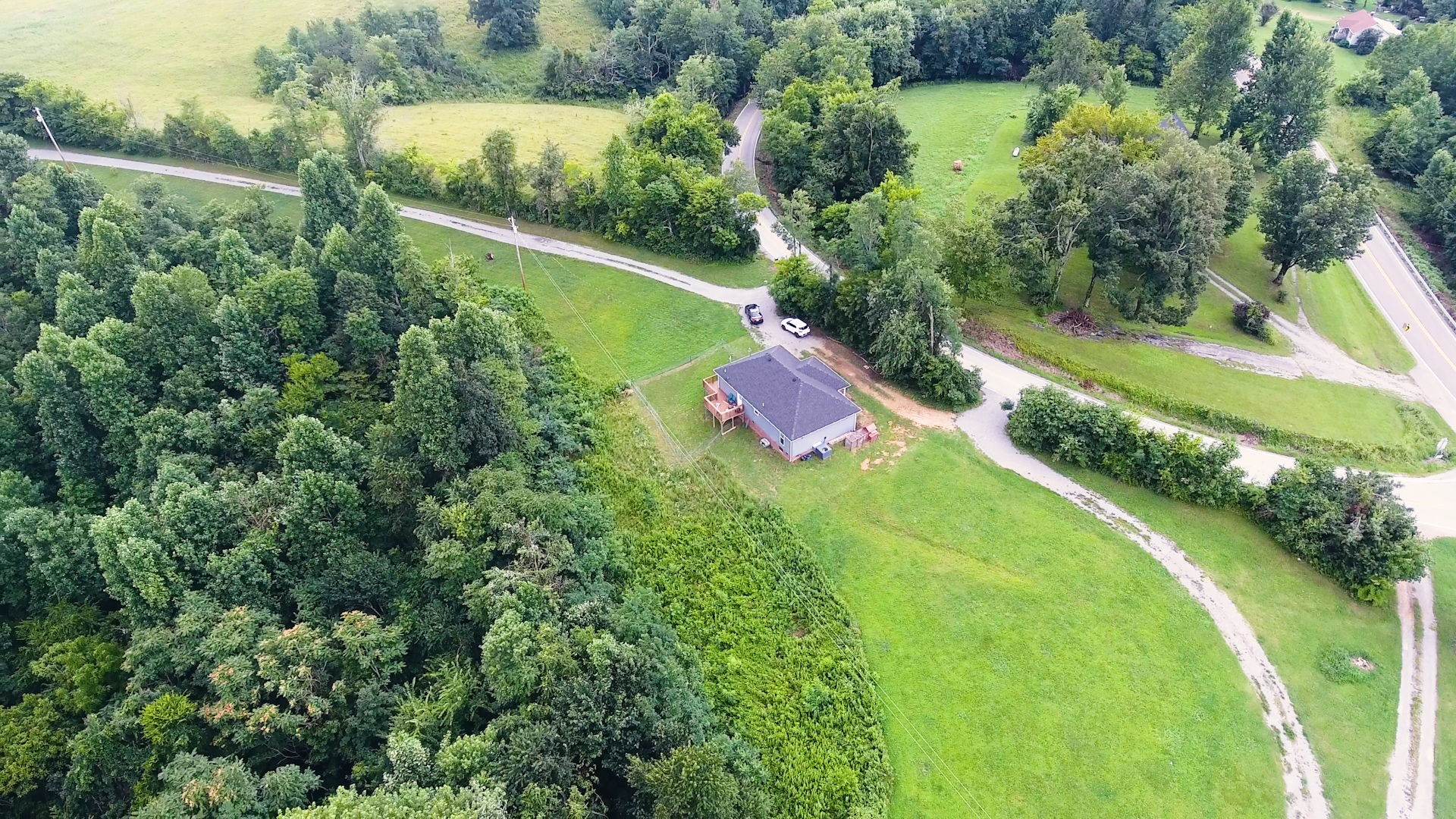 7018 Charity Road Petersburg, TN 37144 - Photo 20 of 25 an aerial view of a house with a yard