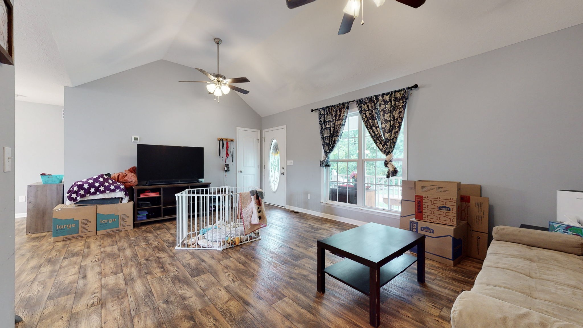 7018 Charity Road Petersburg, TN 37144 - Photo 3 of 25 a living room with furniture and a flat screen tv