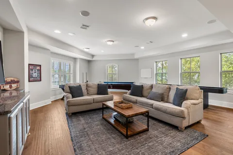 a living room with furniture and a couch