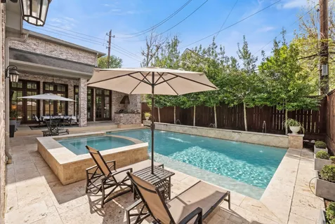a view of a backyard with sitting area and furniture