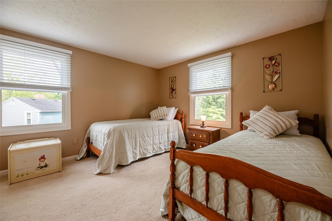 77 Misty Pine Road Perinton, NY 14450 - Photo 34 of 47 THIS BEDROOM HAS TWO WINDOWS AND A DOUBLE CLOSET.