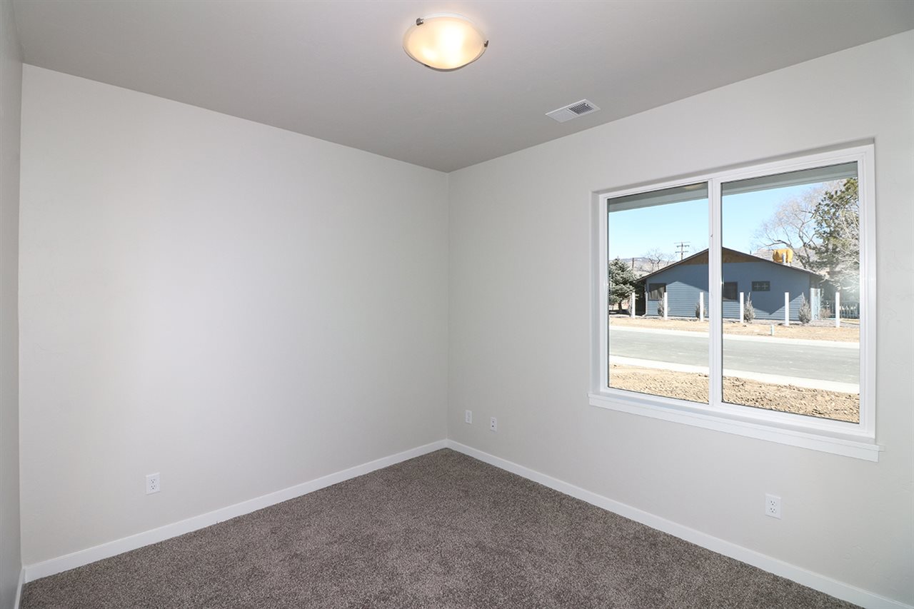 810 Rupp Avenue Palisade, CO 81526 - Photo 13 of 27 an empty room with a window