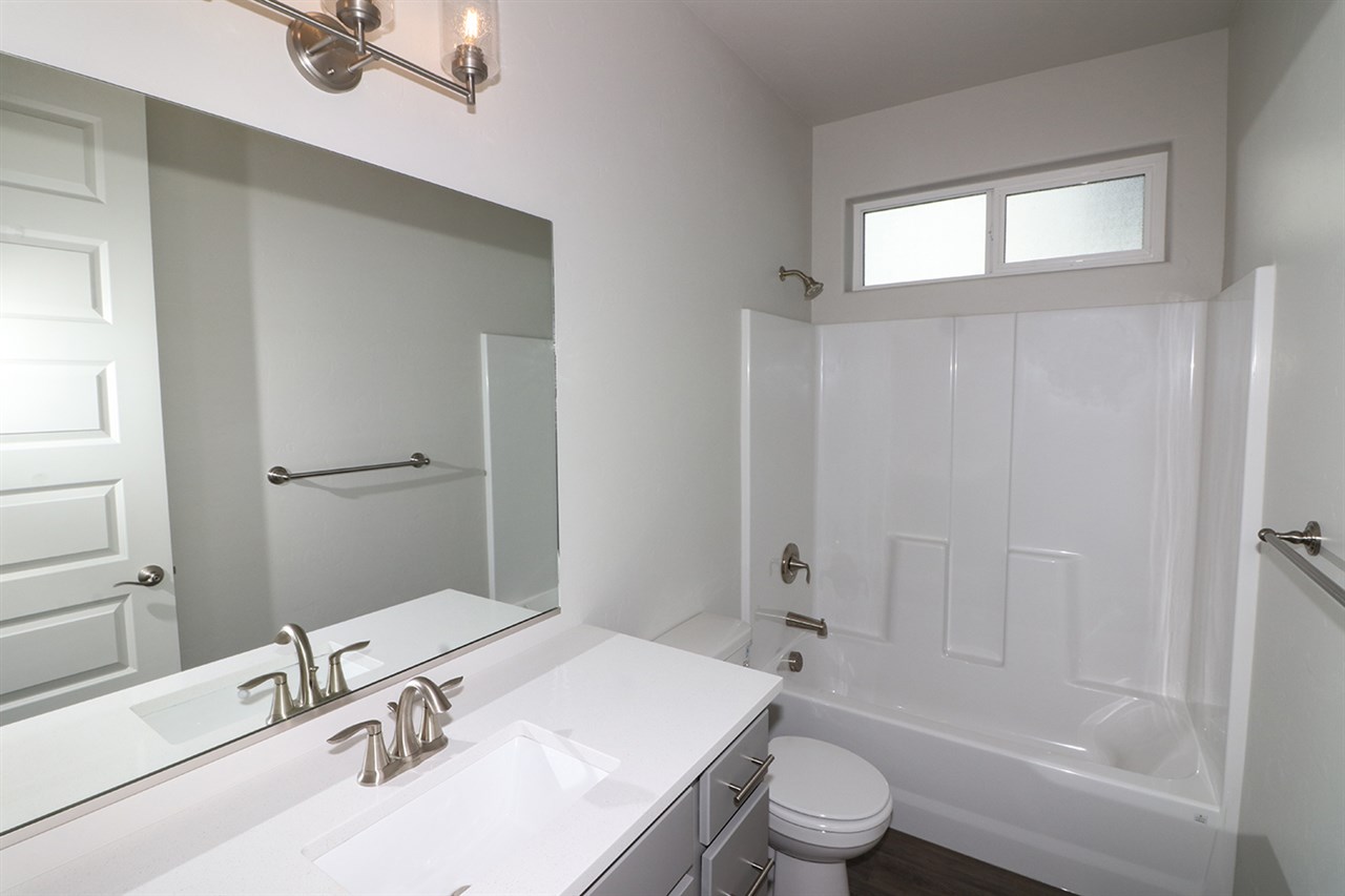 810 Rupp Avenue Palisade, CO 81526 - Photo 18 of 27 a bathroom with a sink toilet and shower