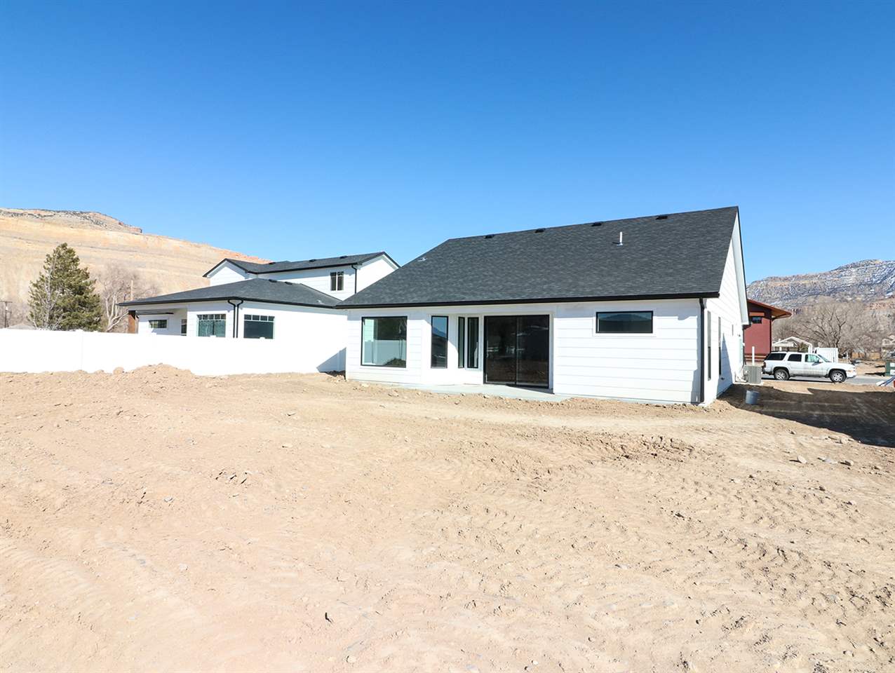 810 Rupp Avenue Palisade, CO 81526 - Photo 26 of 27 a front view of a house with a yard