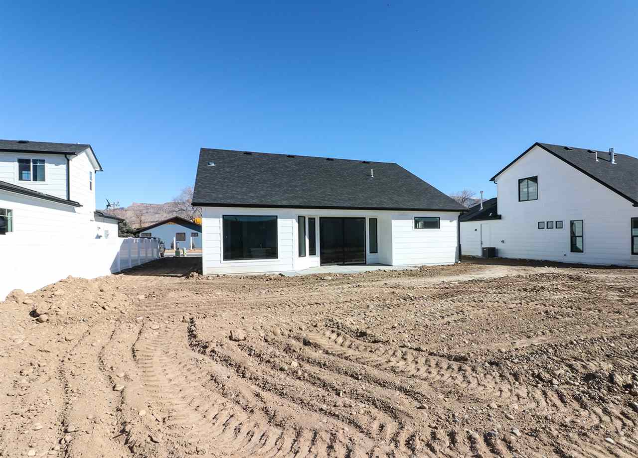 810 Rupp Avenue Palisade, CO 81526 - Photo 27 of 27 a front view of a house with a yard