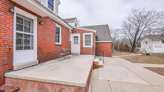 a view of a hallway with washer and dryer
