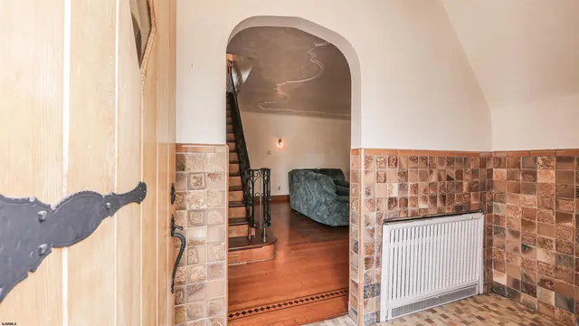 a bedroom with a bed and a window with outer view