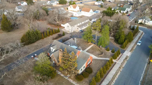 a kitchen with a sink and a refrigerator