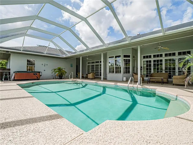 a view of a backyard with porch area and porch